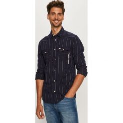 Tommy Jeans - Koszula. Niebieskie koszule męskie Tommy Jeans, s, bez wzorów, z bawełny, klasyczne, z klasycznym kołnierzykiem, z długim rękawem. Za 359,90 zł.