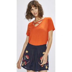 Answear - Top Stripes Vibes. Pomarańczowe topy damskie ANSWEAR, l, z dzianiny. W wyprzedaży za 19,90 zł.