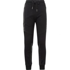 Spodnie chłopięce: Retour Jeans VALENTIJN Spodnie treningowe black