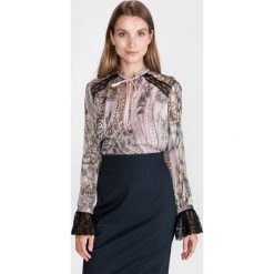 Just Cavalli Bluzka Beżowy. Brązowe bluzki damskie Just Cavalli, l, bez wzorów, z jedwabiu, bez kołnierzyka, bez rękawów. Za 1606,95 zł.