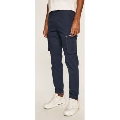 Tommy Jeans - Spodnie. Niebieskie spodnie męskie Tommy Jeans, l, bez wzorów, z elastanu. Za 449,90 zł.