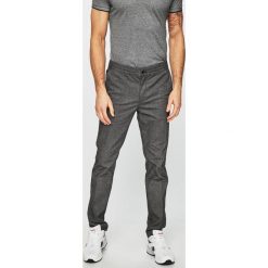 Tommy Hilfiger - Spodnie. Niebieskie spodnie męskie TOMMY HILFIGER, na co dzień, s, bez wzorów, z elastanu, casualowe. W wyprzedaży za 319,90 zł.