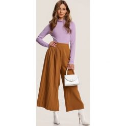 Ciemnobeżowe Spodnie Culottes Sarnixi. Brązowe spodnie damskie Renee, s, bez wzorów, z tkaniny. Za 109,99 zł.