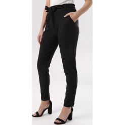 Czarne Spodnie Charianne. Czarne jeansy damskie Born2be, xl. W wyprzedaży za 44,99 zł.