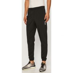 Adidas - Spodnie. Czarne spodnie męskie Adidas, s, bez wzorów, z elastanu. Za 179,90 zł.