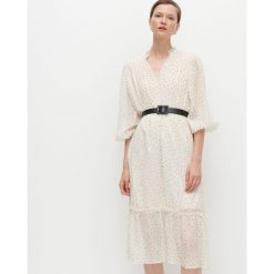 Sukienka w kropki -. Sukienki damskie Reserved, s, bez wzorów, bez kołnierzyka, bez rękawów. Za 199,99 zł.