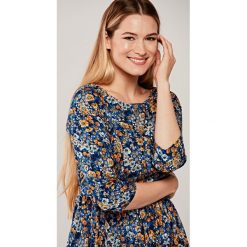 Sukienka Melania Arabella 36. Pomarańczowe sukienki damskie na jesień, s, w kwiaty, z bawełny, bez kołnierzyka, bez rękawów, rozkloszowane. Za 397,00 zł.