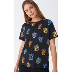 T-shirt Harry Potter - Czarny. Czarne t-shirty damskie House, s, bez wzorów, bez kołnierzyka. Za 39,99 zł.