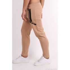 Spodnie sportowe KALEO PEACH. Pomarańczowe jeansy męskie Spodnie sportowe KALEO PEACH, s, bez wzorów, sportowe. W wyprzedaży za 59,00 zł.