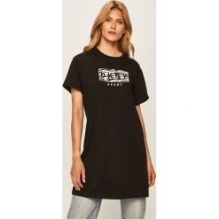 Dkny - T-shirt. Czarne topy damskie DKNY, s, z nadrukiem, z bawełny, z krótkim rękawem. Za 299,90 zł.
