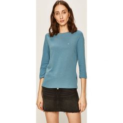 Calvin Klein - Bluzka. Niebieskie bluzki damskie Calvin Klein, na co dzień, s, bez wzorów, z bawełny, z okrągłym kołnierzem, bez rękawów. W wyprzedaży za 139,90 zł.