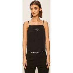 Calvin Klein Jeans - T-shirt. Różowe bluzki damskie Calvin Klein Jeans, s, z nadrukiem, z elastanu, casualowe, z okrągłym kołnierzem, z krótkim rękawem. W wyprzedaży za 219,90 zł.