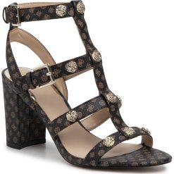 Sandały GUESS - Magale2 FL6GL2 FAL03 BROCR. Pomarańczowe klapki damskie Guess, z aplikacjami, ze skóry ekologicznej, bez obcasa, na obcasie. Za 749,00 zł.