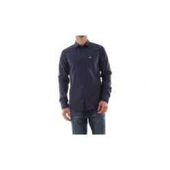 Koszule z długim rękawem Tommy Jeans DM0DM05991 SOLID POPLIN SHI. Koszule męskie Tommy Jeans. Za 244,10 zł.