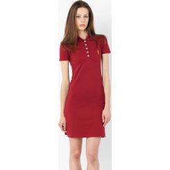 Sukienka Polo Bordo "Gold". Białe sukienki damskie Edward Orlovski, s, z haftami, z elastanu, sportowe, polo, bez rękawów, sportowe. Za 80,00 zł.