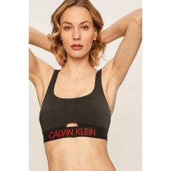 Calvin Klein - Biustonosz kąpielowy. Czarne stroje kąpielowe damskie Calvin Klein, s, z aplikacjami, z elastanu. W wyprzedaży za 259,90 zł.