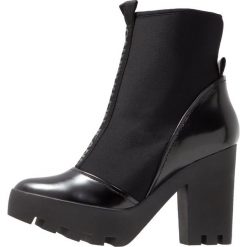 Calvin Klein Jeans STEFANIA Botki na obcasie black. Brązowe botki damskie na obcasie marki Calvin Klein Jeans, z jeansu. Za 619,00 zł.