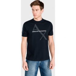 Armani Exchange Koszulka Niebieski. Niebieskie podkoszulki męskie Armani Exchange, s, z nadrukiem, z bawełny, z krótkim rękawem. Za 233,95 zł.