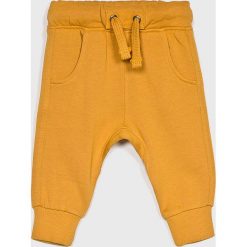Blukids - Spodnie dziecięce 68-98 cm. Zielone spodnie chłopięce Blukids, bez wzorów, z bawełny, casualowe. W wyprzedaży za 29,90 zł.