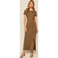 Vero Moda - Sukienka. Czarne sukienki damskie Vero Moda, na co dzień, s, bez wzorów, z elastanu, casualowe, z okrągłym kołnierzem, z krótkim rękawem, krótkie, midi, proste. W wyprzedaży za 89,90 zł.
