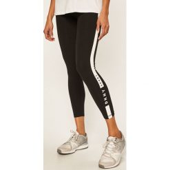 Dkny - Legginsy. Czarne spodnie damskie DKNY, s, z nadrukiem, z elastanu. Za 249,90 zł.