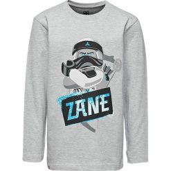 Koszulka "CM-50115" w kolorze szarym. Szare t-shirty chłopięce LEGO Wear, z nadrukiem, z bawełny, z długim rękawem. W wyprzedaży za 35,95 zł.