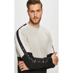 Reebok - Bluza. Bluzy męskie Reebok, s, bez wzorów, z poliesteru, z okrągłym kołnierzem, bez rękawów, bez kaptura. W wyprzedaży za 179,90 zł.