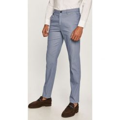 Tommy Hilfiger Tailored - Spodnie. Niebieskie spodnie męskie Tommy Hilfiger Tailored, bez wzorów, z elastanu. W wyprzedaży za 429,90 zł.