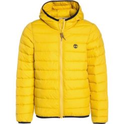 Timberland Kurtka zimowa goldgelb. Żółte kurtki męskie marki Timberland, na zimę, z materiału. W wyprzedaży za 366,75 zł.