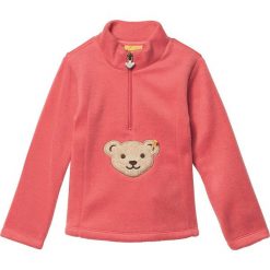 Bluza w kolorze jasnoczerwonym. Czerwone bluzy niemowlęce Steiff, z aplikacjami, bez rękawów, bez kaptura. W wyprzedaży za 58,95 zł.