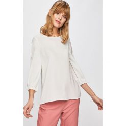 Vero Moda - Bluzka. Białe bluzki damskie Vero Moda, na co dzień, s, bez wzorów, z poliesteru, casualowe, z okrągłym kołnierzem, bez rękawów. W wyprzedaży za 69,90 zł.