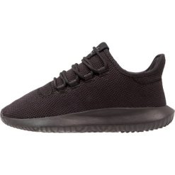 Adidas Originals TUBULAR SHADOW Tenisówki i Trampki core black/footwear white. Czarne trampki dziewczęce adidas Originals, z tworzywa sztucznego. Za 299,00 zł.