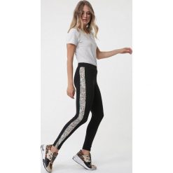 Czarno-Niebieskie Legginsy Birigui. Czarne legginsy sportowe damskie Born2be, s, bez wzorów, z materiału, tenisowe. Za 49,99 zł.