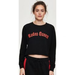 Bluzy damskie: Krótka bluza - Czarny