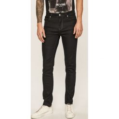 Marciano Guess - Jeansy. Niebieskie jeansy męskie MARCIANO GUESS, z aplikacjami. W wyprzedaży za 329,90 zł.