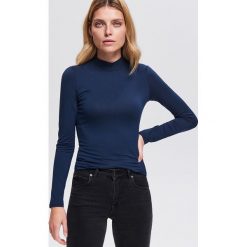 Bluzka ze stójką - Granatowy. Niebieskie bluzki damskie marki Reserved, s, bez wzorów, ze stójką, bez rękawów. Za 49,99 zł.