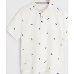 Mango Kids - Polo dziecięce Hanoi 11-164 cm. Białe t-shirty chłopięce Mango Kids, bez wzorów, z bawełny, z krótkim rękawem. Za 59,90 zł.