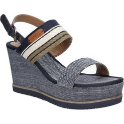 Sandały na koturnie wrangler jeena sunshine wl171660. Niebieskie koturny damskie Wrangler, bez obcasa, na koturnie, bez zapięcia. Za 349,99 zł.