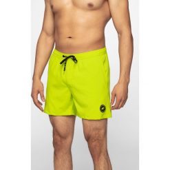 Spodenki plażowe męskie SKMT300 - soczysta zieleń neon. Żółte spodenki i szorty męskie 4f, na lato, m, bez wzorów, z materiału. Za 49,99 zł.
