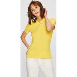 Tommy Jeans - Top. Białe topy damskie Tommy Jeans, m, z bawełny. W wyprzedaży za 149,90 zł.