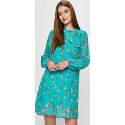 Answear - Tunika Secret Garden. Zielone sukienki damskie ANSWEAR, na co dzień, s, w kwiaty, z elastanu, casualowe, bez kołnierzyka, z długim rękawem, długie, mini, rozkloszowane. W wyprzedaży za 79,90 zł.