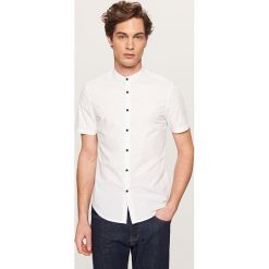 Koszula super slim fit - Jasny szar. Szare koszule męskie Reserved, s, bez wzorów, bez kołnierzyka, bez rękawów. W wyprzedaży za 49,99 zł.