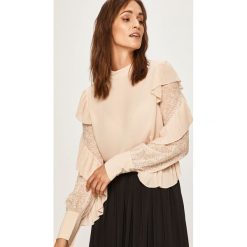 Marciano Guess - Bluzka. Czarne bluzki damskie MARCIANO GUESS, z aplikacjami, z elastanu, ze stójką, z długim rękawem. W wyprzedaży za 399,90 zł.