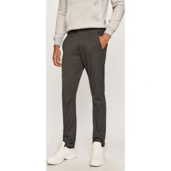 G-Star Raw - Spodnie. Szare spodnie męskie G-Star RAW, bez wzorów, z elastanu, retro. Za 559,90 zł.