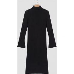 Sukienka w kolorze czarnym. Czarne sukienki damskie Rodier, l, z wełny, klasyczne, z golfem, midi. W wyprzedaży za 279,95 zł.