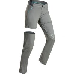 Spodnie turystyczne 2w1- MH550 - damskie. Brązowe spodnie damskie QUECHUA, l, z elastanu. Za 169,99 zł.