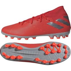 Buty piłkarskie adidas Nemeziz 19.3 Ag M F99994. Czerwone buty sportowe męskie Adidas, z materiału, na sznurówki, do piłki nożnej. W wyprzedaży za 339,00 zł.