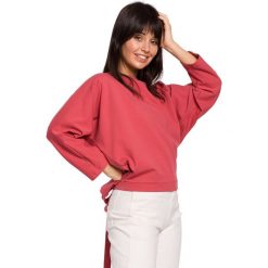 Bluza nietoperz z guzikami i wiązaniem z tyłu - koralowy. Pomarańczowe bluzy damskie BE, s, bez wzorów, z elastanu, bez rękawów, bez kaptura. Za 179,00 zł.