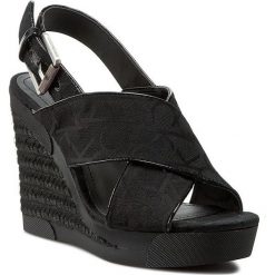 Espadryle CALVIN KLEIN JEANS - Elaine RE9607 Black. Czarne espadryle damskie marki Calvin Klein Jeans, bez wzorów, z jeansu, bez obcasa, na obcasie. W wyprzedaży za 369,00 zł.