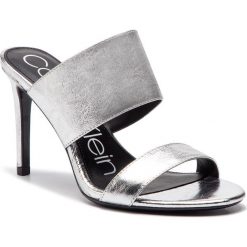 Klapki CALVIN KLEIN - Rema E8927 Silver. Szare klapki damskie Calvin Klein, bez wzorów, ze skóry ekologicznej, bez obcasa, na obcasie. Za 629,00 zł.